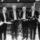 Gell-Mann (second from left) receiving his Nobel Prize in 1969.